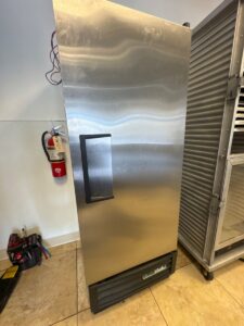 Repaired True Mfg reach in freezer in Austin Texas.
