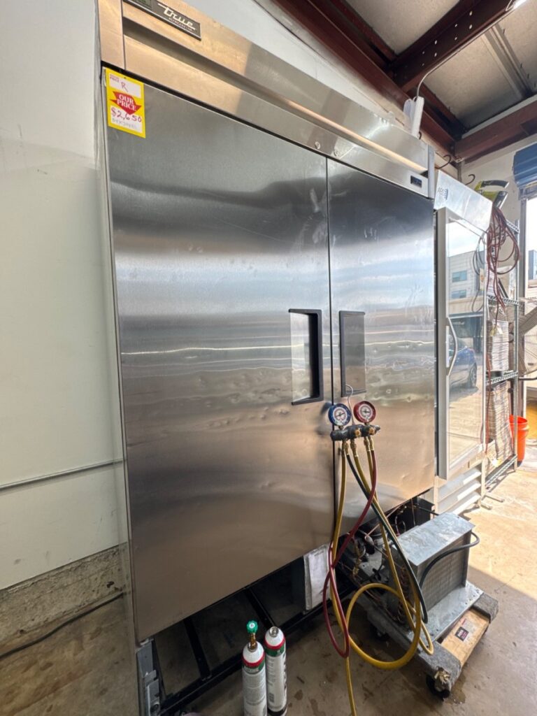 Repaired a refrigerant leak on a two door True manufacturing cooler in Austin, Texas.