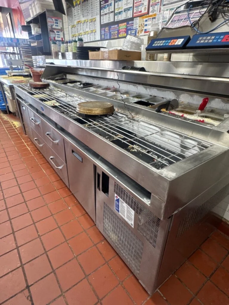 Prepared refrigerant leak located on pizza prep table at Domino’s in North Austin, Texas