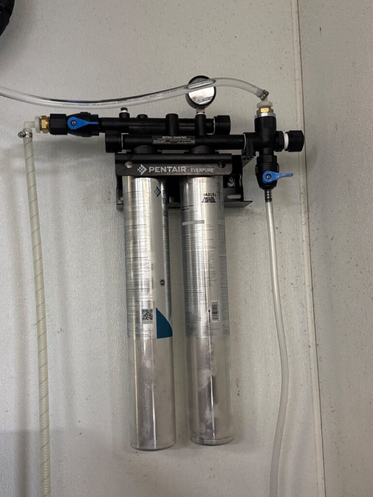 Install new ice machine filter on Hoshizaki ice machine