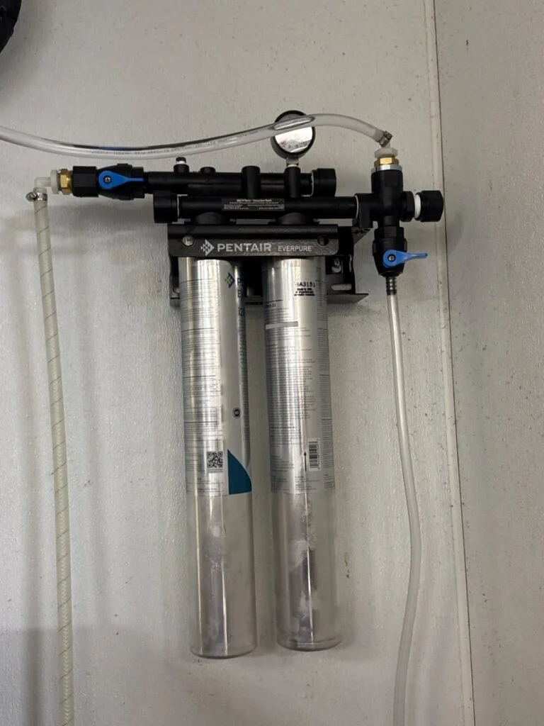 Install new ice machine filter on Hoshizaki ice machine