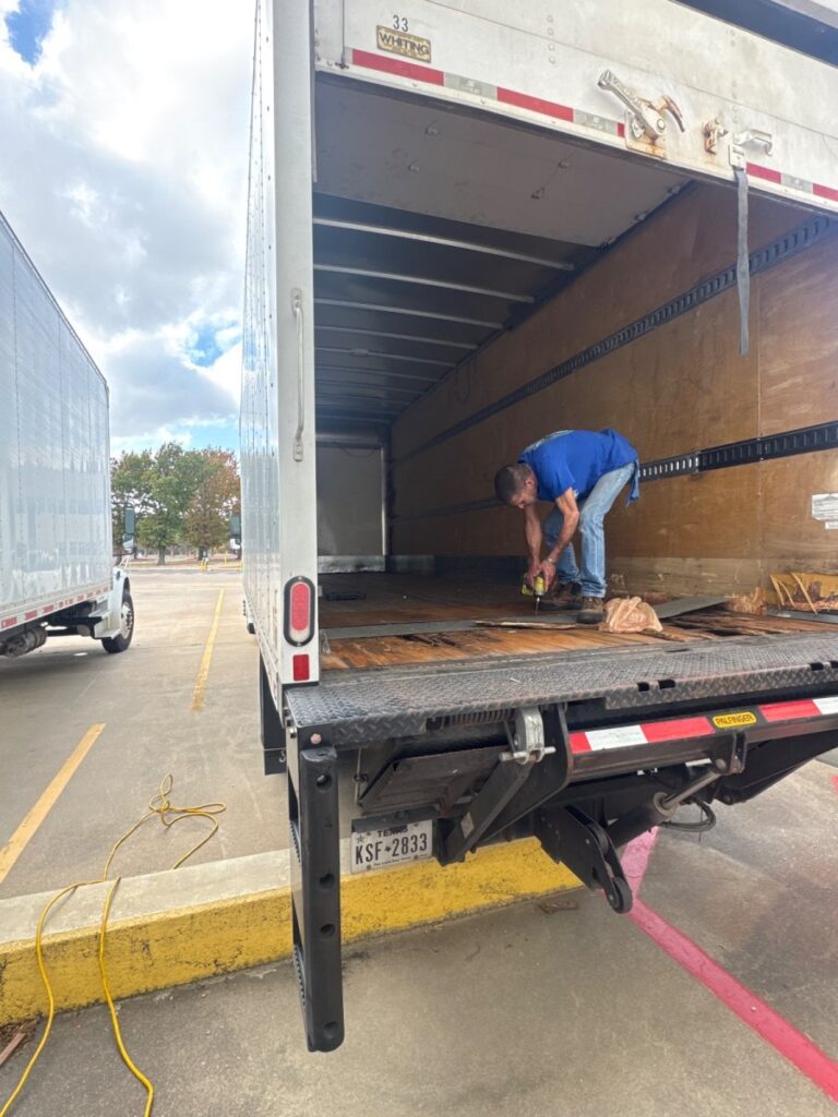 Repaired wood paneling inside of box truck in round rock Texas