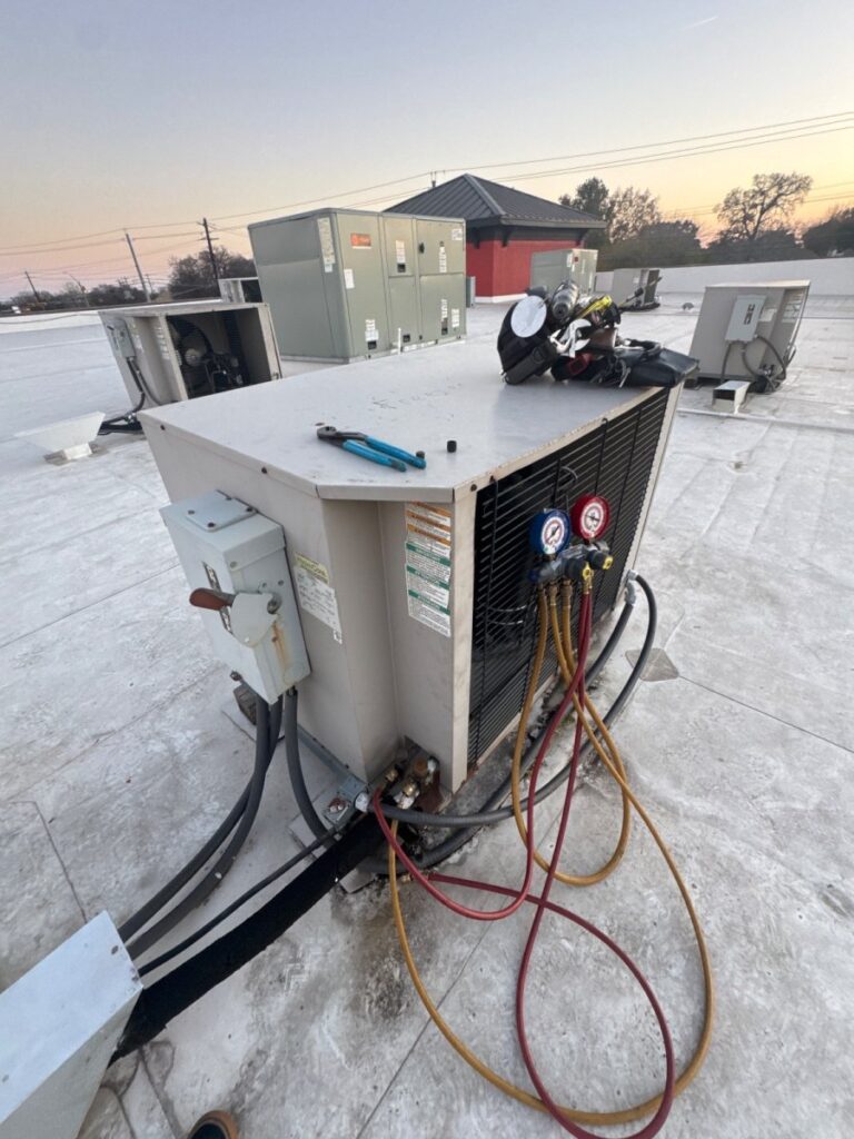Refilled refrigerant on a walk-in freezer at a meat market in Austin, Texas