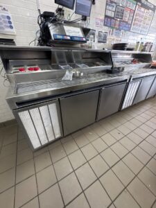 Diagnosed pizza prep table in Elgin, Texas