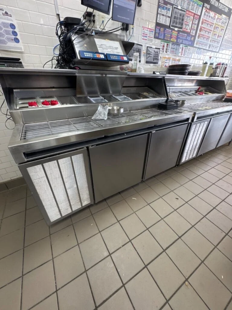 Diagnosed pizza prep table in Elgin, Texas