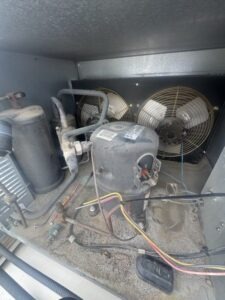 Performed commercial refrigeration compressor replacement on an R22 refrigeration system in Austin TX after diagnosing a fail...