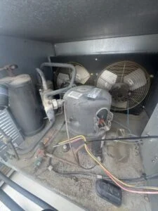 Performed commercial refrigeration compressor replacement on an R22 refrigeration system in Austin TX after diagnosing a fail...