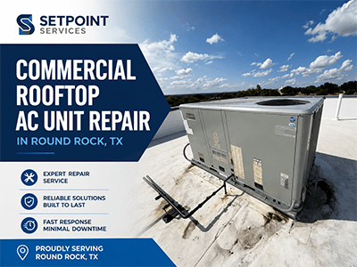 Trane rooftop commercial AC unit serviced on a flat roof at a Round Rock, TX commercial building