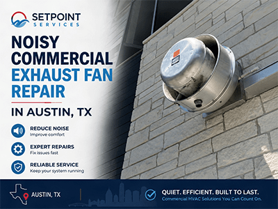 Stainless steel commercial kitchen exhaust fan mounted on a stone building wall in Austin, TX