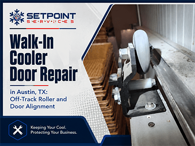 Off-track roller assembly on a walk-in cooler door at an Austin, TX commercial kitchen