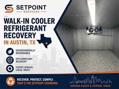 Ceiling-mounted evaporator unit inside an emptied commercial walk-in cooler in Austin, TX