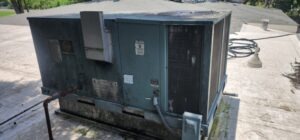 Completed commercial rooftop HVAC repair on a Rheem RKNL-A060JK10E rooftop unit after the customer reported the air condition...