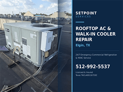 Trane rooftop packaged HVAC unit serviced at a commercial building in Elgin, TX