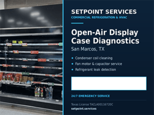 Open-air refrigerated display case with warm shelves at a San Marcos, TX convenience store awaiting condenser repairs