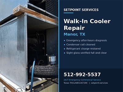 Commercial walk-in cooler condensing unit with the access panel open during refrigeration service in Manor, TX
