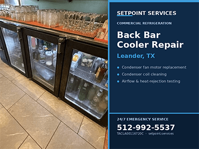 Glass-door commercial back bar cooler line beneath a bar top at a Leander, TX bar