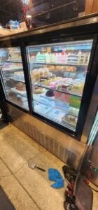 Setpoint Services performed commercial refrigeration repair on an Iron Mountain Refrigeration reach-in display cooler at Tous...