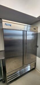 Setpoint Services performed preventive maintenance on an Avanco two-door commercial reach-in refrigerator at Wingman Kitchens...